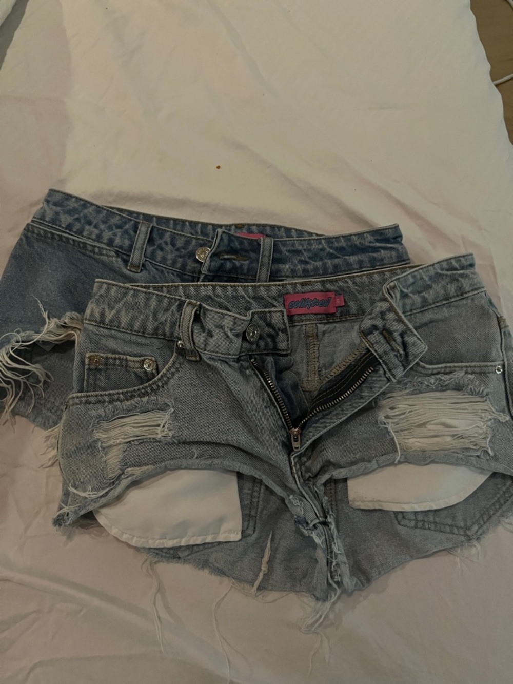Edikted Light Blue Distressed Denim Cutoff Shorts with Pink Label